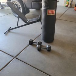 Punching Bag, Weight Bench, and Dumbbells