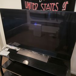 Sony bravia X900E 49” + Tv Stand