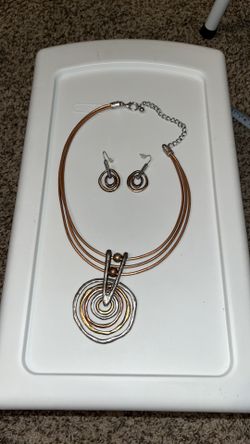 Bronze and silver colored Clay style necklace and matching earrings.