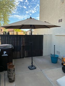 2 Concrete Patio Umbrella Stands and Umbrella