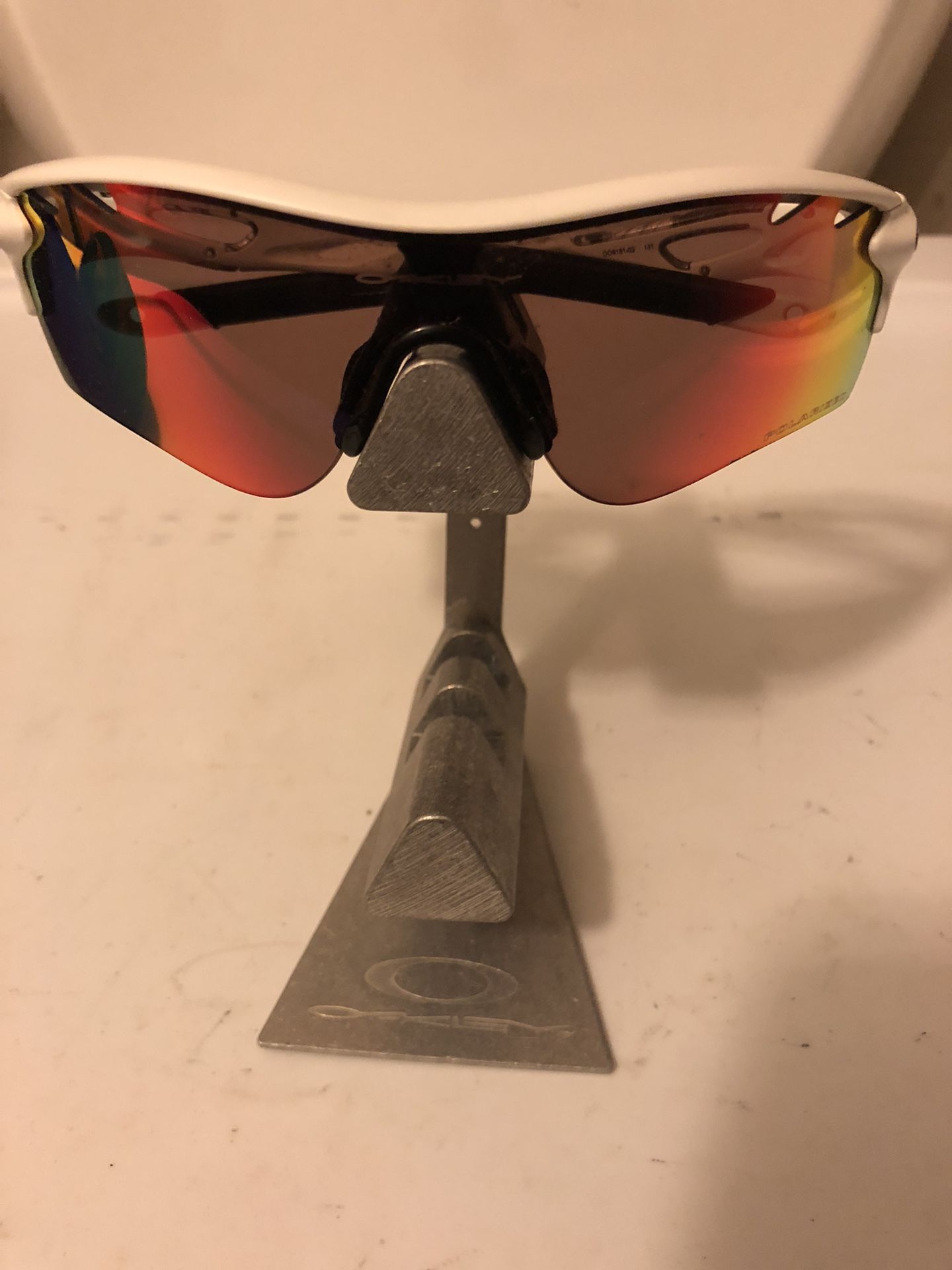 Oakley Stand And Glasses