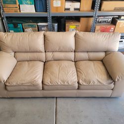 Leather Couch With Cover And Two Pillows 