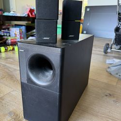 BOSE subwoofer and 2 speakers