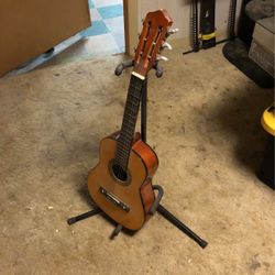 Kids guitar with stand