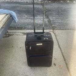 Luggage Carry on Roller, by Embark, 8 deep, 14 w, 22 long, all zippers work, $15