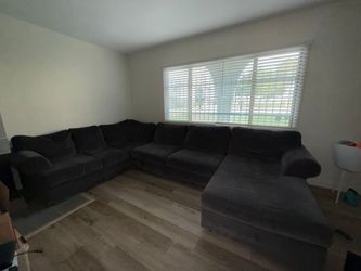 $10 Large Dark Gray Sectional Sofa
