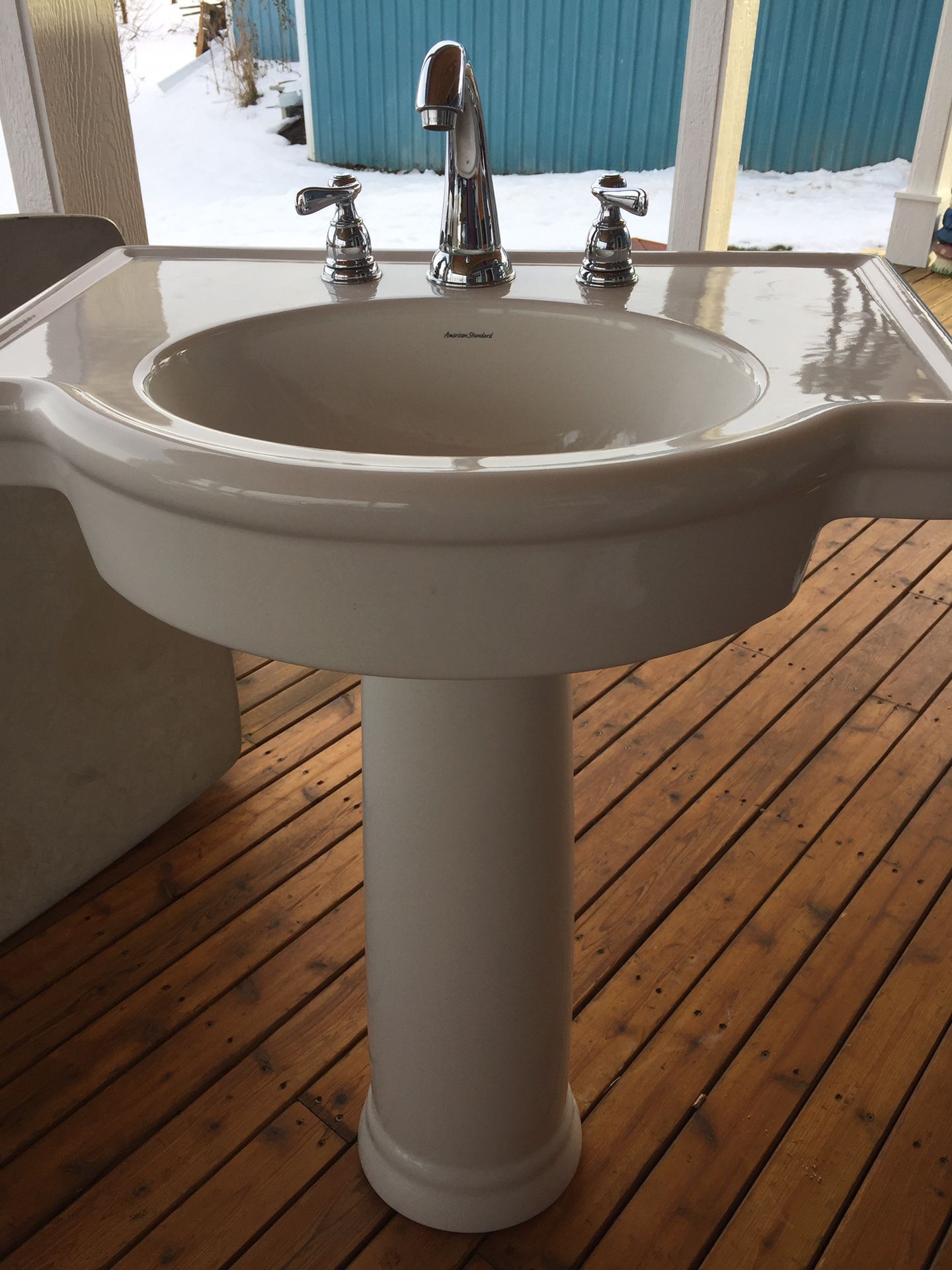 Beautiful American Standard pedestal sink with faucet