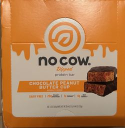 Unopened box of No Cow Dipped Chocolate Peanut Butter Cup Protein Bars
