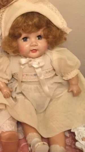 Vintage gorgeous old ANTIQUE doll crier no cracks no missing parts original dress and bonnet face is excellent 1940's composition over 50 yrs old