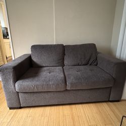 Grey love seat