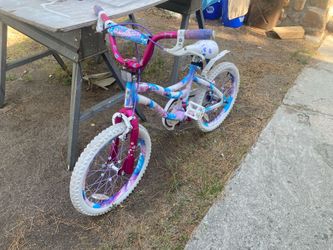 Girls princess BMX bike with 18 inch wheels.