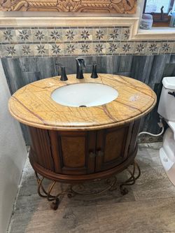 $300 OBO - Round Bathroom Vanity with Marble Top and Faucet