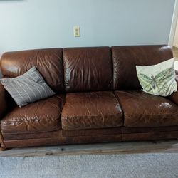 Leather couch (Chair & ottoman Available)