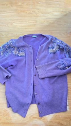 Salvage Value of Purple Cardigan Sweater.