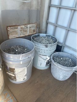 Buckets of roofing nails