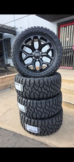 20" CHEVY rims w/ 33" MT tires