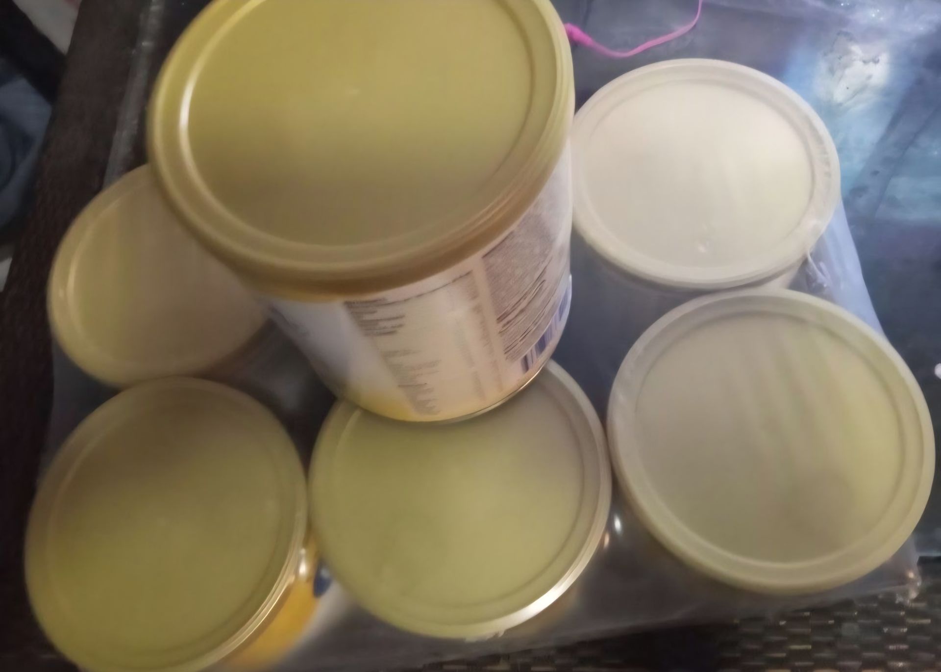 6 yellow cans