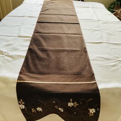 New Table Runner 72” X 14”, Brown With Embroidery And Ribbon Floral Work On Edges.