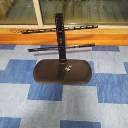 Insignia  universal swivel TV base stand. 
