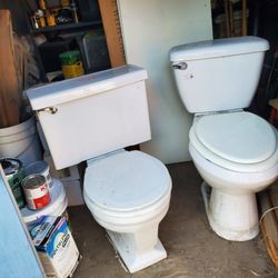 2 American STANDARD White Toilets All in Working