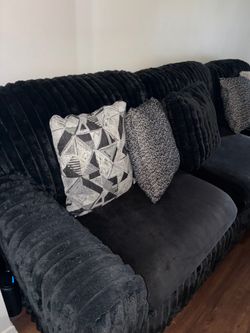 Fluffy black couch