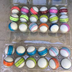 30 Taylormade tour response stripe golf balls, various colors all in great clean playable condition, not water balls. 