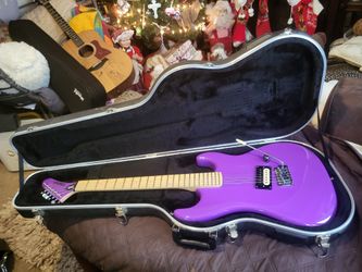 Solid Body Electric Guitar Kramer Baretta Special Electric Purple with Whammy Bar
And hardshell case