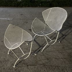 Mid century modern wrought iron Salterini orange slice/clam patio chair and ottoman located by Miami Design District 