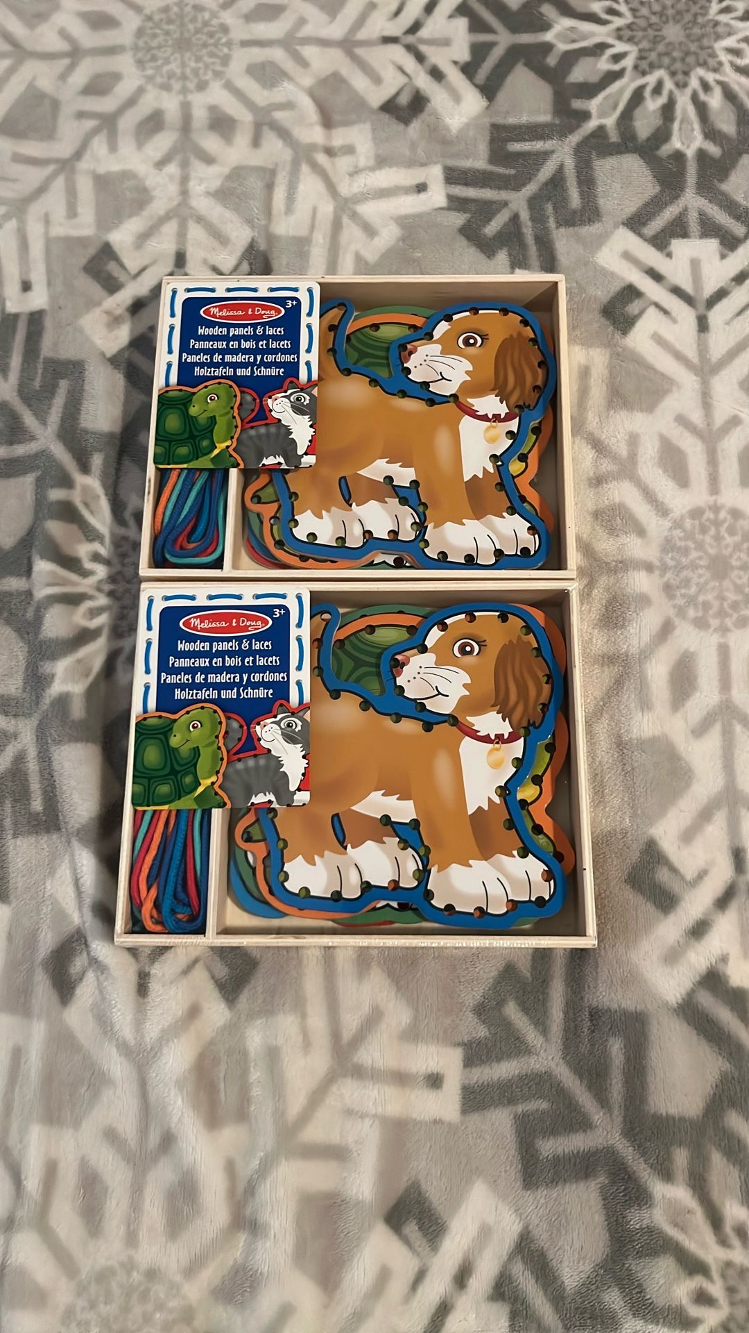 Melissa & Doug Lace & Trace Pets wooden lacing toy set.