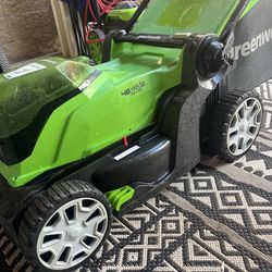 Lawn mower cordless. 48v.  2 batteries and charger. Works great