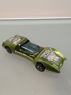 Hot Wheels Redline 1969 Hong Kong Green MOD QUAD

All Wheels turn very smoothly. Plastic windshield is removable, cabin hatch moves well. 

Light scra