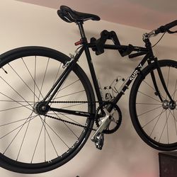 Surly Steamroller Track Bike + Thompson Components + H Plus Son Wheels + Omnium SRAM Crankset + DT Swiss Hubs + Cane Creek Headset + Off Road Tires