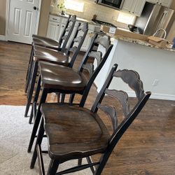 4 Black/brown Solid Wood Stools From Weir’s Furniture Store.