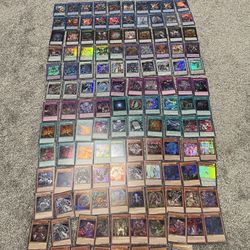 130 Yu-Gi-Oh! Cards + Free Collectibles  