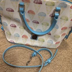 Brand new in plastic Dooney&Burke