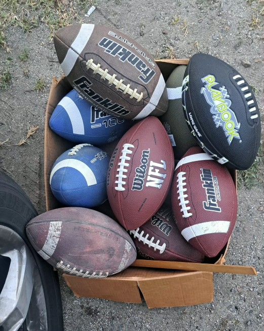 Box of footballs.