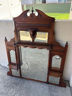Antique Victorian carved wood overmantel mirror