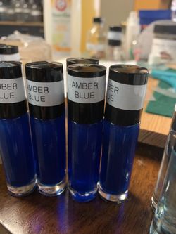 AMBER BLUE BODY OIL FRAGRANCE rollons