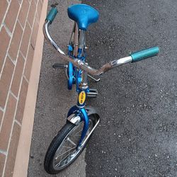 1960's original schwinn pixie blue bike with 16x1.75 tires 