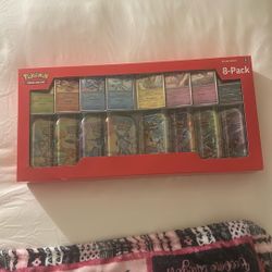 Pokémon Prismatic Evolutions Mini Tins 8-Pack