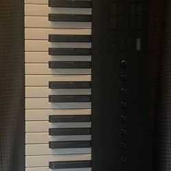 Complete Control Keyboard The Color Is Black And White 