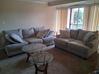 Cream Sofa and Loveseat . 3 end table set
