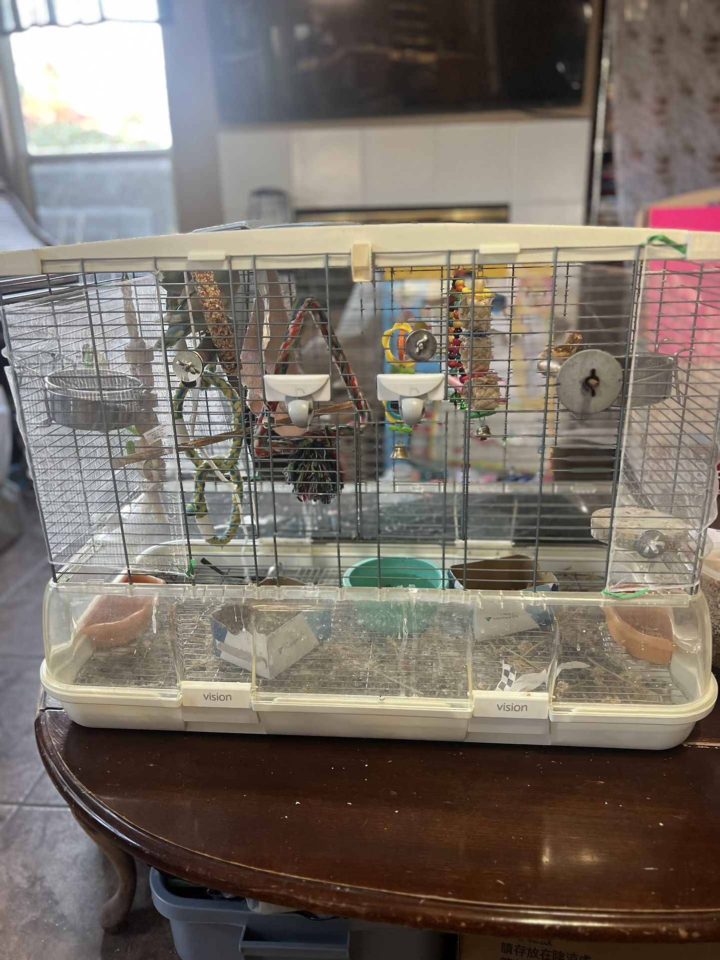 Bird cage —-Visions With All Toys Inside &Removable Bottom Tray Inside With Water & Food Dishes X 2 Sets. —14x28x22
