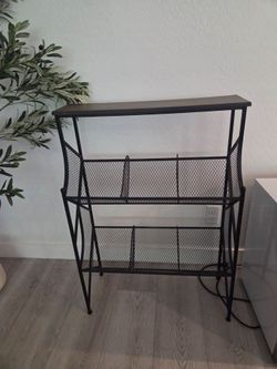 Metal mesh and wood shelf