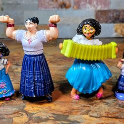 Disney 4-Lot Collection Of Disney Encanto Character Figures Of Primrily Luisa Madrigal In Different Sizes & Poses • figures Measure From 4"-2" -Long .