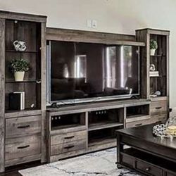 Huge Entertainment Unit With A 65 Inch Lg Smart Tv