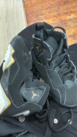 Air Jordan Black and Gold Sneakers