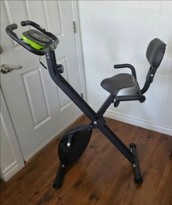 CRANE: Stationary Folding Exercise Bike with Back Rest. TRACKS: SPEED, TIME, ODO, CAL, PULSE. ADJUSTABLE TENSION. EXCELLENT CONDITION!