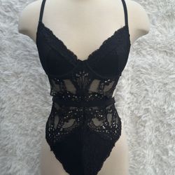 Black Lace one piece Bodysuit in size large 