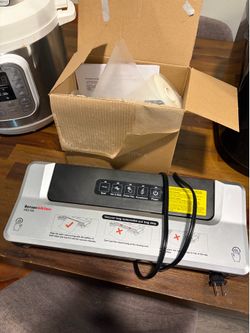 Vacuum sealer with bags